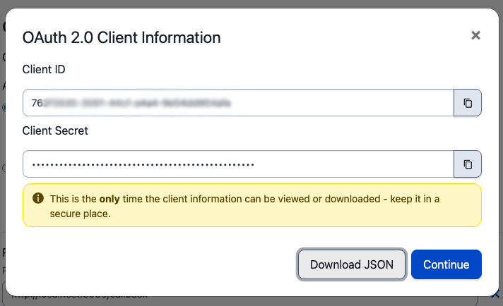 A dialog box in the PagerDuty web UI. The title of the box is “OAuth 2.0 Client Information”. There are two read-only text boxes. The first box is “Client ID”. The content in the box is blurred out. There is a copy tool at the right of the box. The second box, below the first, is “Client Secret” and the content here is represented by dots. There is also a copy tool on this box. Below the text boxes are two buttons: “Download JSON” in gray and “Continue” in blue.